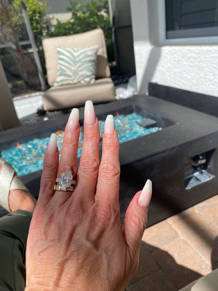 Long pink stiletto nails